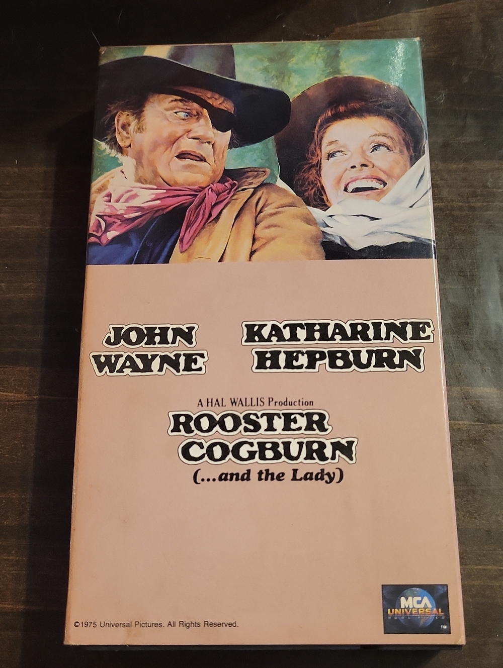 Rooster Cogburn VHS Tape - Pink Cover (Universal)